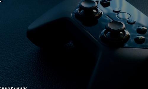 A close-up of hands holding a game controller